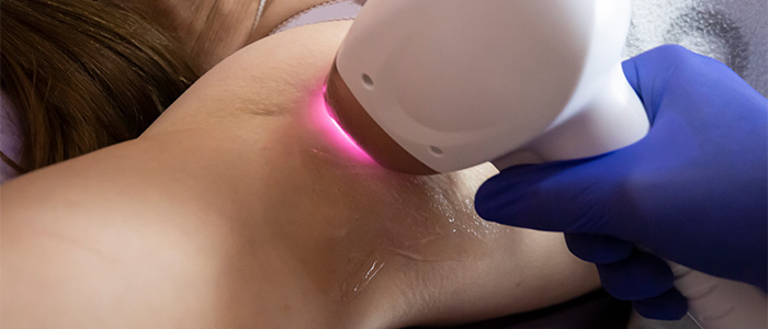 a patient receiving light force laser therapy treatment'